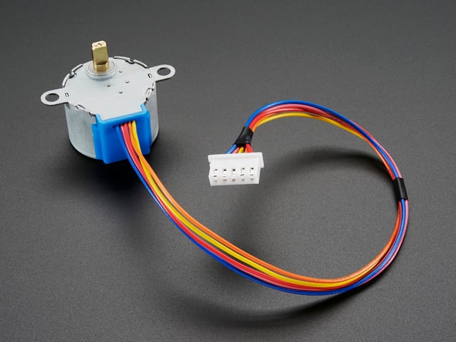 Angled shot of a Small Reduction Stepper Motor. 