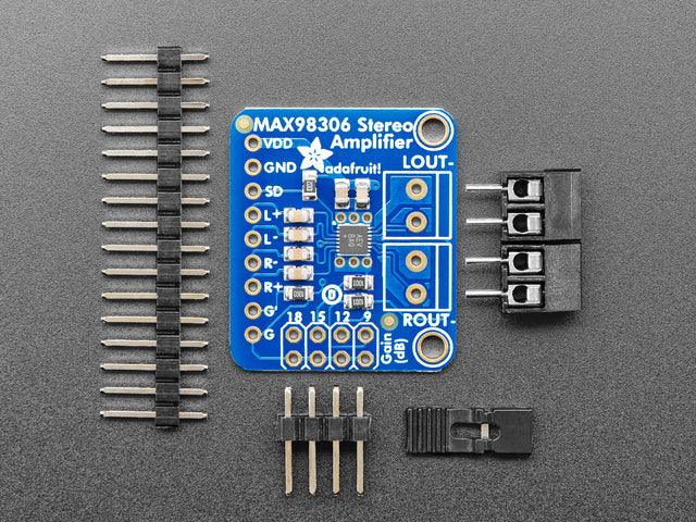 Top down view of a Stereo 3.7W Class D Audio Amplifier surrounded by different kinds of pins. 